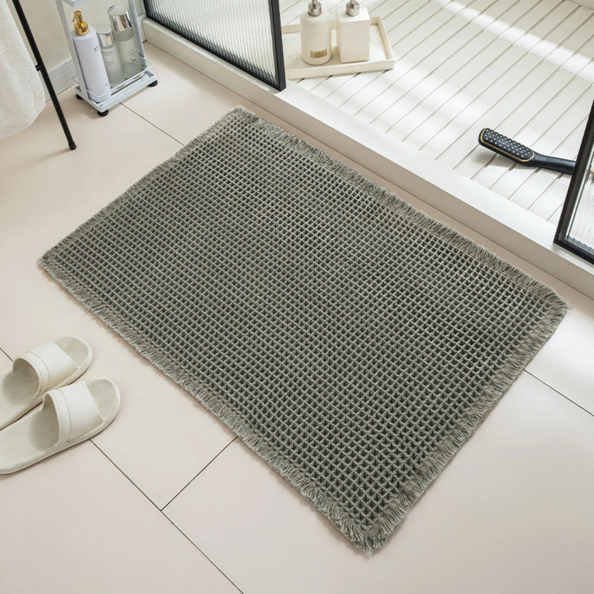 Tapis de bain nid d'abeille à franges