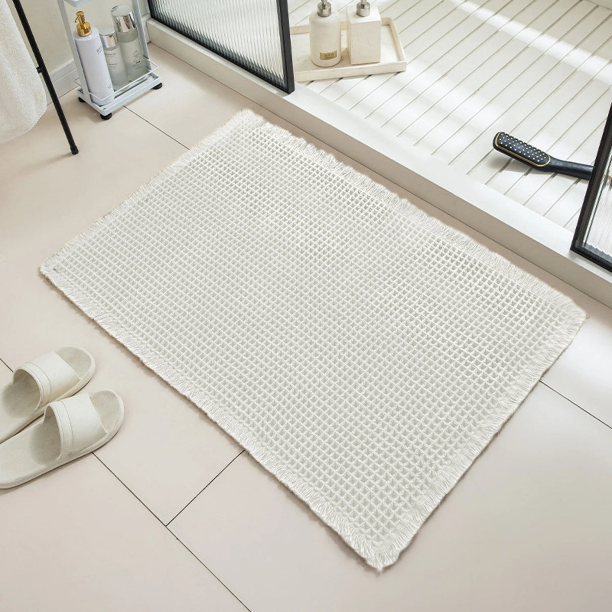 Tapis de bain nid d'abeille à franges