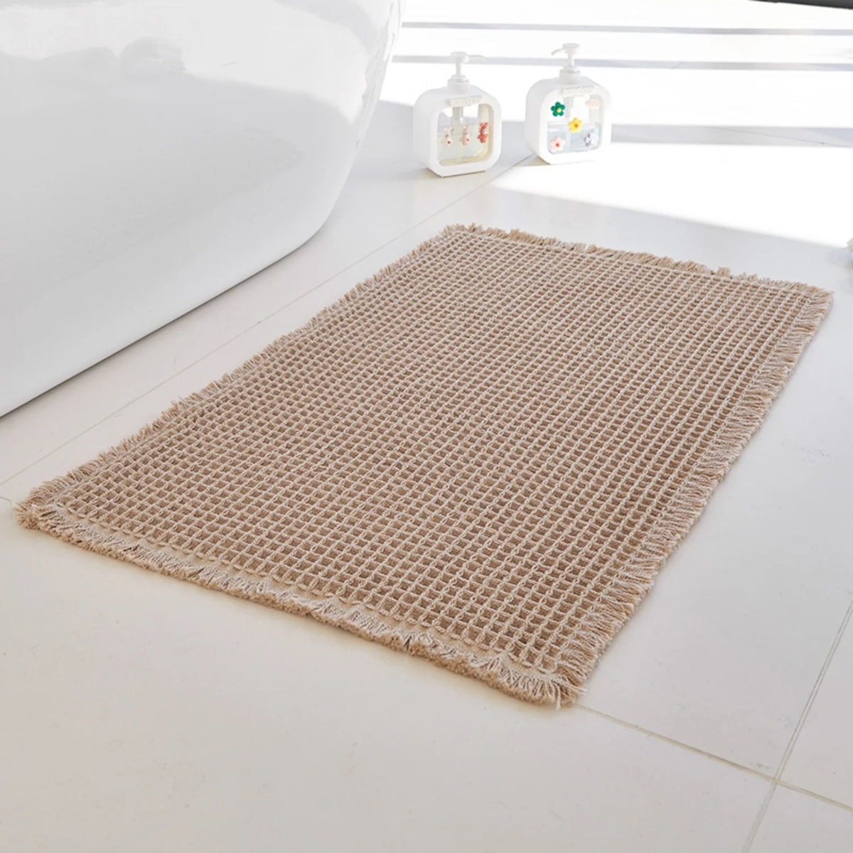 Tapis de bain nid d'abeille à franges