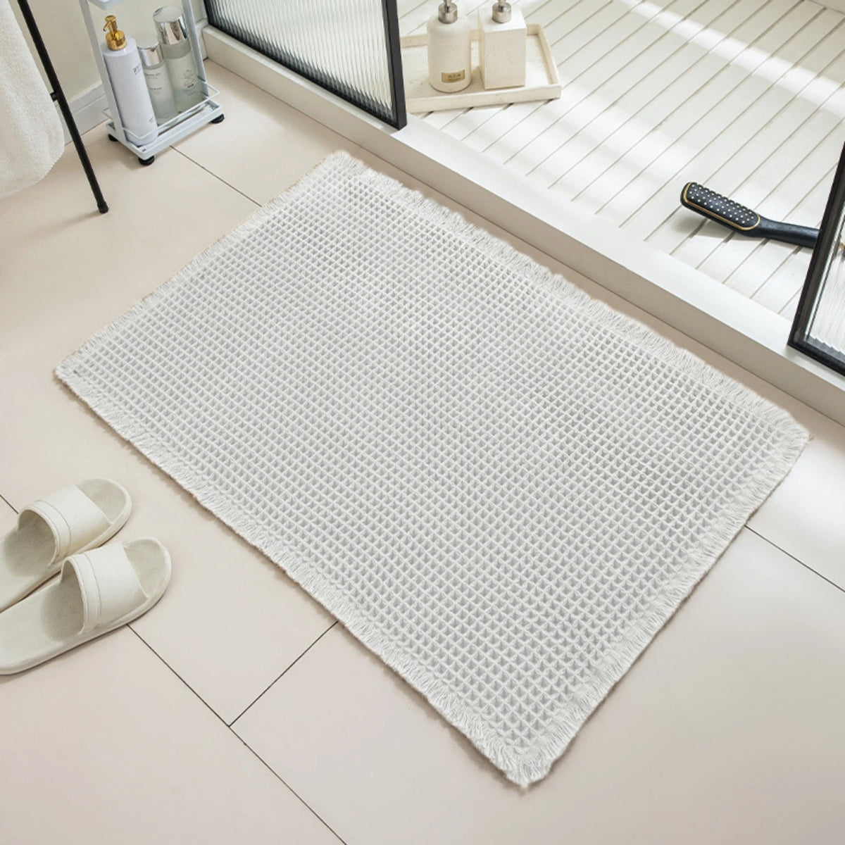 Tapis de bain nid d'abeille à franges